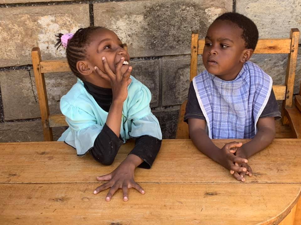 two children thinking what to say.